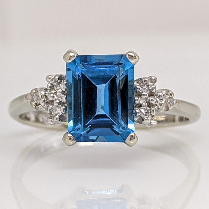 10K WHITE BLUE TOPAZ EMERALD CUT 6X8 WITH (6) MELEE ESTATE RING 2.6 GRAMS