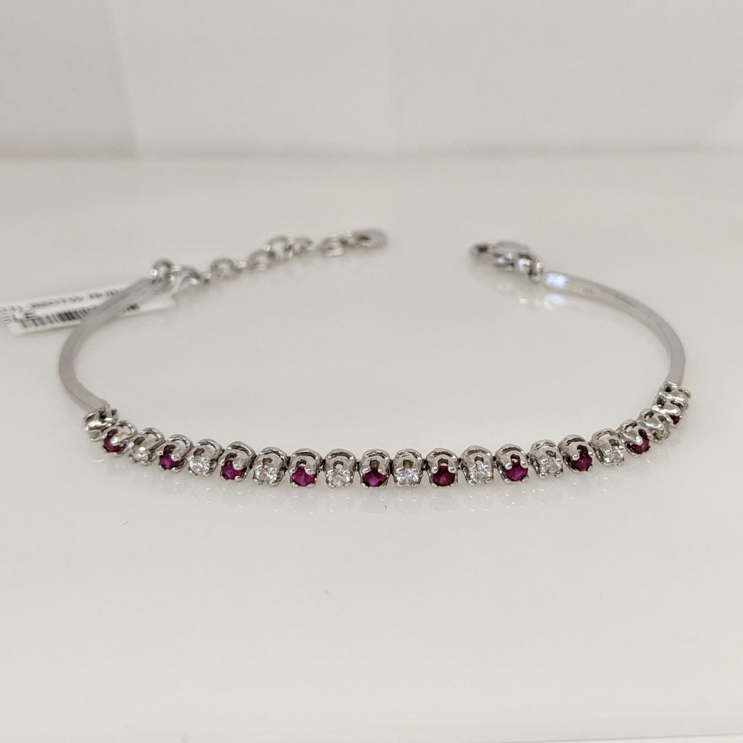 14K .51 CARAT TOTAL WEIGHT DIAMOND ROUND (11) .62 CARAT TOTAL WEIGHT RUBY ROUND (10) FLEXABLE ESTATE BRACELET 9.4 GRAMS