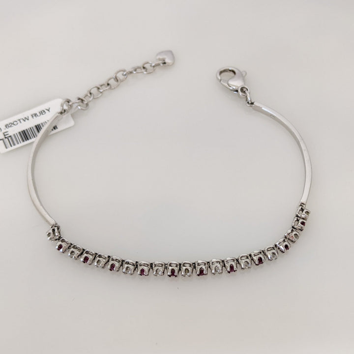 14K .51 CARAT TOTAL WEIGHT DIAMOND ROUND (11) .62 CARAT TOTAL WEIGHT RUBY ROUND (10) FLEXABLE ESTATE BRACELET 9.4 GRAMS