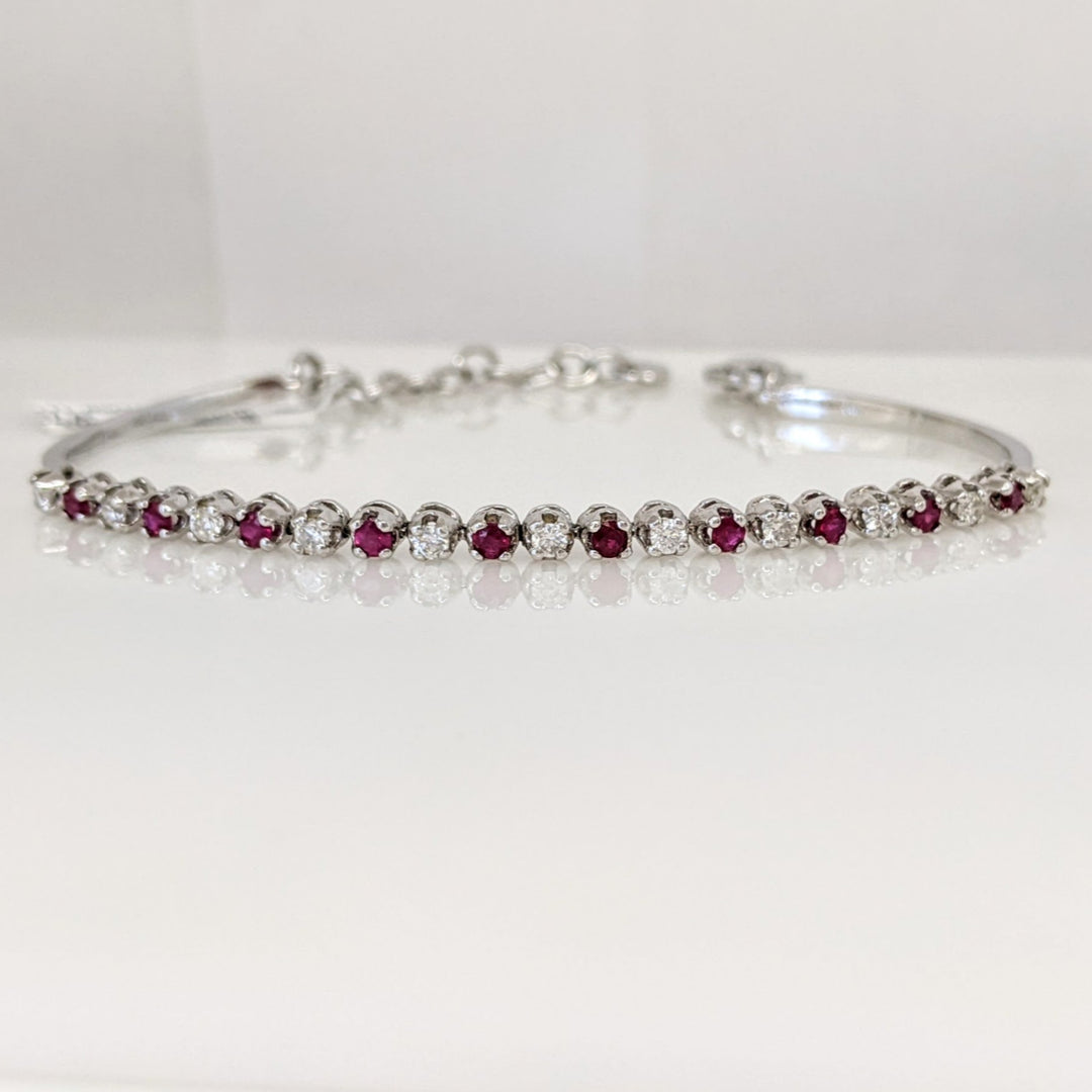 14K .51 CARAT TOTAL WEIGHT DIAMOND ROUND (11) .62 CARAT TOTAL WEIGHT RUBY ROUND (10) FLEXABLE ESTATE BRACELET 9.4 GRAMS