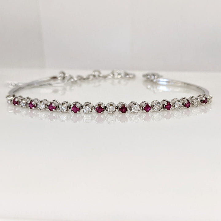 14K .51 CARAT TOTAL WEIGHT DIAMOND ROUND (11) .62 CARAT TOTAL WEIGHT RUBY ROUND (10) FLEXABLE ESTATE BRACELET 9.4 GRAMS