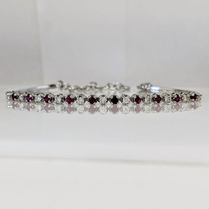 14K .51 CARAT TOTAL WEIGHT DIAMOND ROUND (11) .62 CARAT TOTAL WEIGHT RUBY ROUND (10) FLEXABLE ESTATE BRACELET 9.4 GRAMS