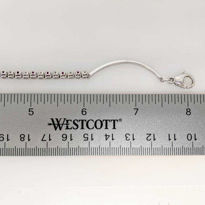 14K .51 CARAT TOTAL WEIGHT DIAMOND ROUND (11) .62 CARAT TOTAL WEIGHT RUBY ROUND (10) FLEXABLE ESTATE BRACELET 9.4 GRAMS
