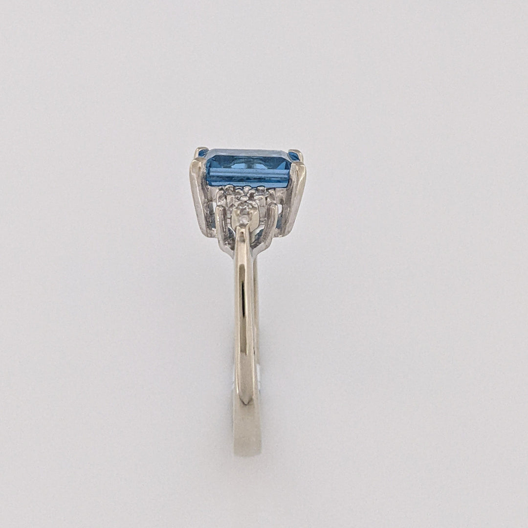 10K WHITE BLUE TOPAZ EMERALD CUT 6X8 WITH (6) MELEE ESTATE RING 2.6 GRAMS