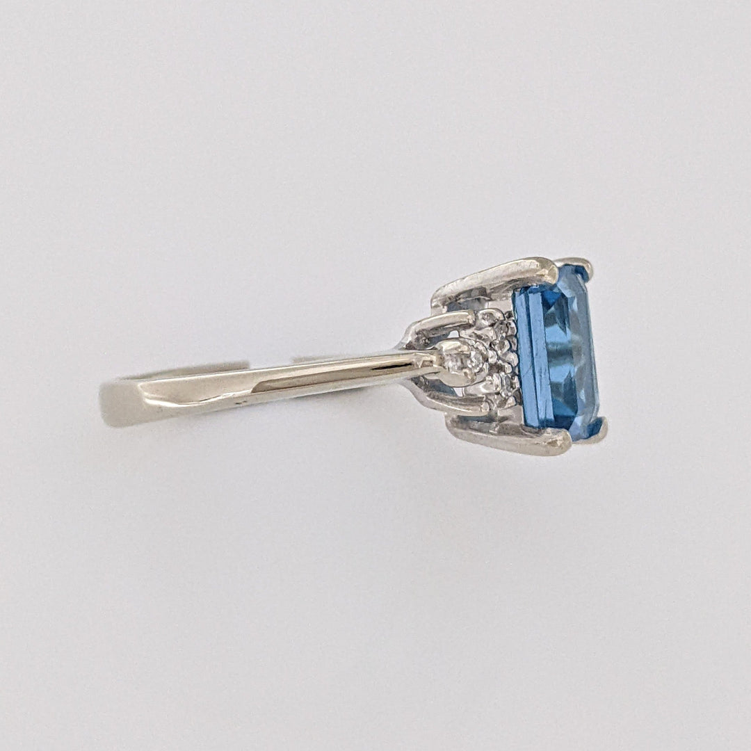 10K WHITE BLUE TOPAZ EMERALD CUT 6X8 WITH (6) MELEE ESTATE RING 2.6 GRAMS