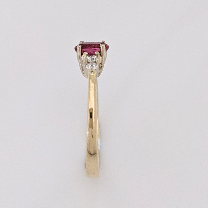 14K PINK TOURMALINE OVAL 4X6 WITH .22 DIAMOND TOTAL WEIGHT ESTATE RING 3.6 GRAMS