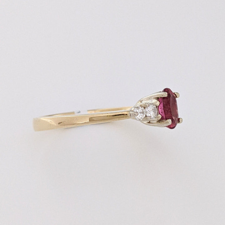 14K PINK TOURMALINE OVAL 4X6 WITH .22 DIAMOND TOTAL WEIGHT ESTATE RING 3.6 GRAMS