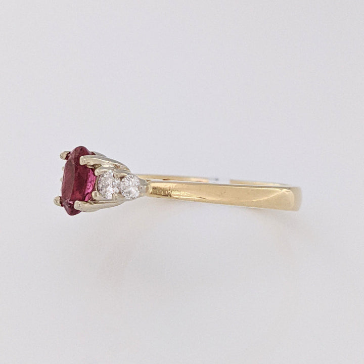 14K PINK TOURMALINE OVAL 4X6 WITH .22 DIAMOND TOTAL WEIGHT ESTATE RING 3.6 GRAMS
