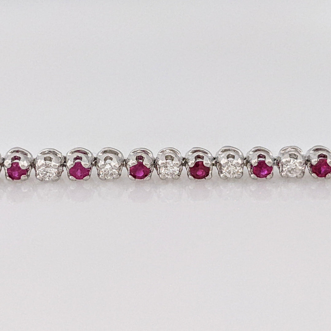 14K .51 CARAT TOTAL WEIGHT DIAMOND ROUND (11) .62 CARAT TOTAL WEIGHT RUBY ROUND (10) FLEXABLE ESTATE BRACELET 9.4 GRAMS