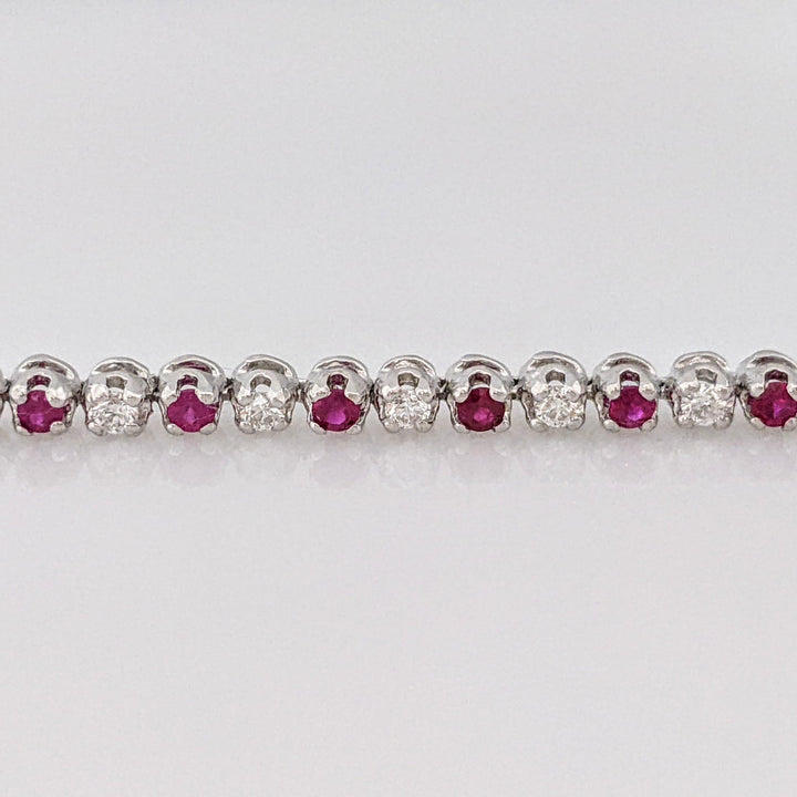 14K .51 CARAT TOTAL WEIGHT DIAMOND ROUND (11) .62 CARAT TOTAL WEIGHT RUBY ROUND (10) FLEXABLE ESTATE BRACELET 9.4 GRAMS