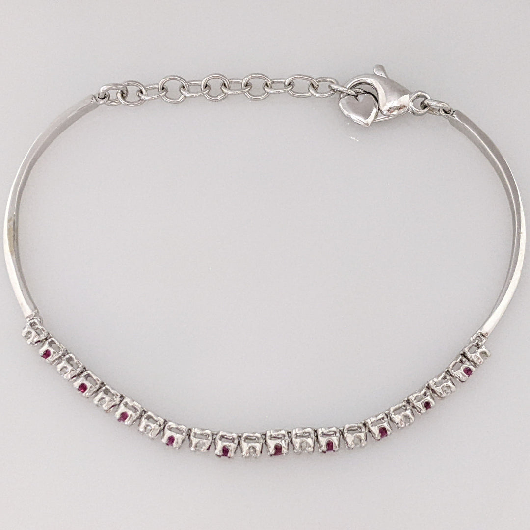 14K .51 CARAT TOTAL WEIGHT DIAMOND ROUND (11) .62 CARAT TOTAL WEIGHT RUBY ROUND (10) FLEXABLE ESTATE BRACELET 9.4 GRAMS