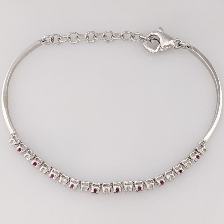 14K .51 CARAT TOTAL WEIGHT DIAMOND ROUND (11) .62 CARAT TOTAL WEIGHT RUBY ROUND (10) FLEXABLE ESTATE BRACELET 9.4 GRAMS