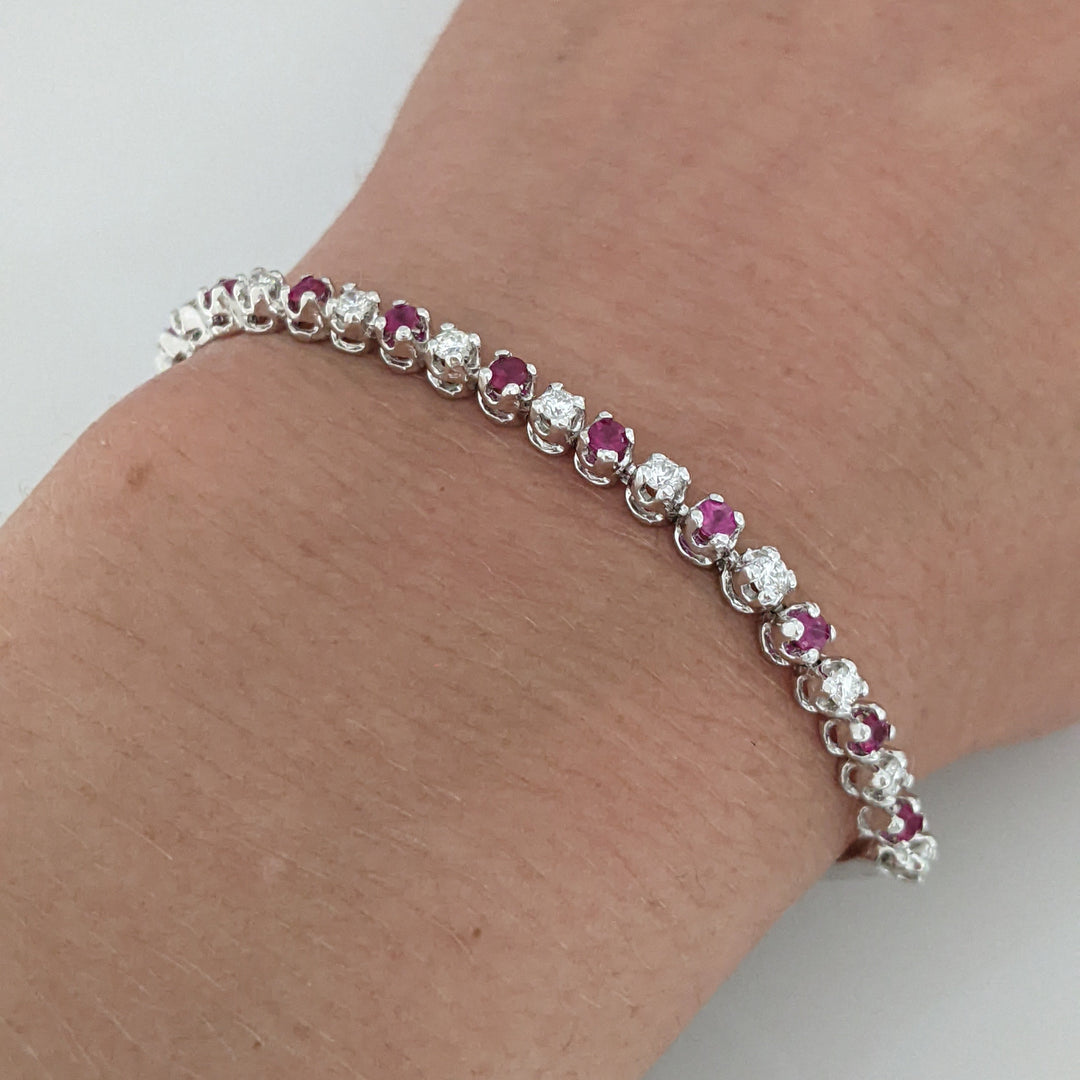 14K .51 CARAT TOTAL WEIGHT DIAMOND ROUND (11) .62 CARAT TOTAL WEIGHT RUBY ROUND (10) FLEXABLE ESTATE BRACELET 9.4 GRAMS