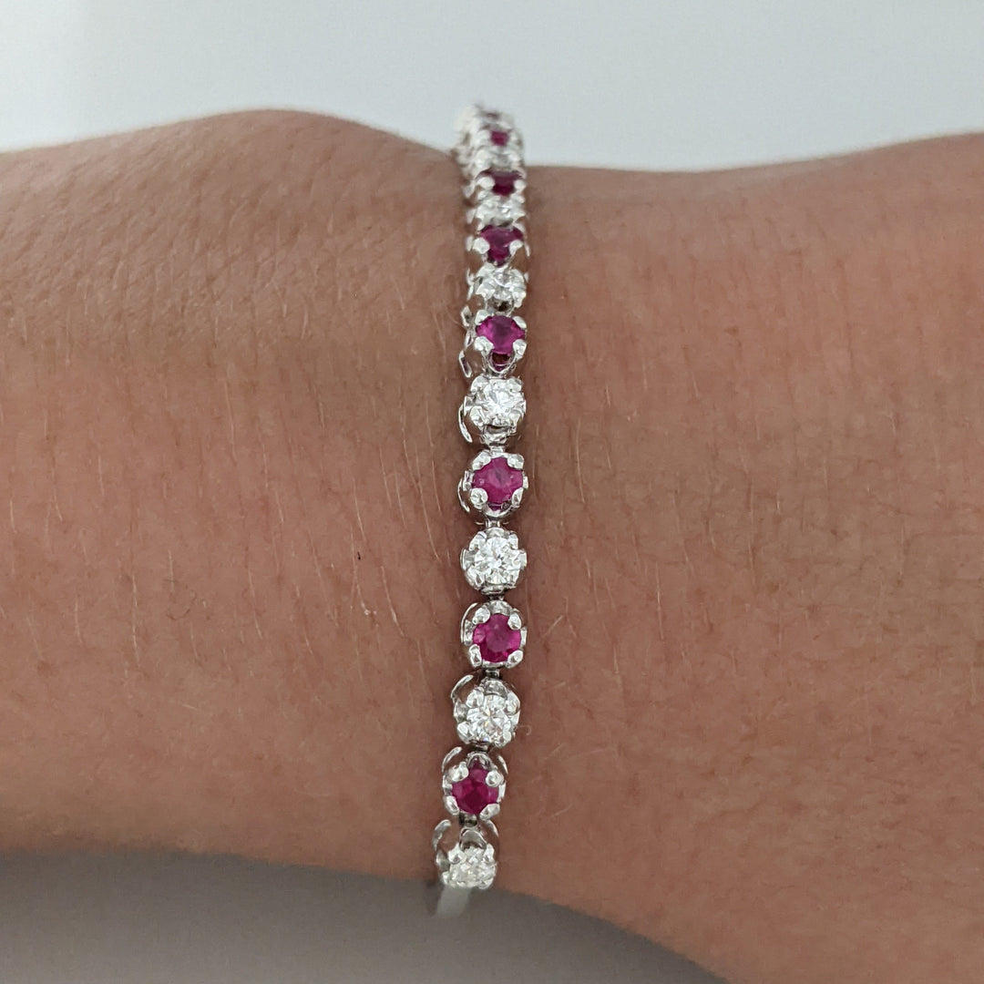 14K .51 CARAT TOTAL WEIGHT DIAMOND ROUND (11) .62 CARAT TOTAL WEIGHT RUBY ROUND (10) FLEXABLE ESTATE BRACELET 9.4 GRAMS