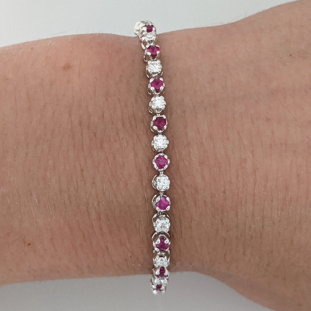 14K .51 CARAT TOTAL WEIGHT DIAMOND ROUND (11) .62 CARAT TOTAL WEIGHT RUBY ROUND (10) FLEXABLE ESTATE BRACELET 9.4 GRAMS