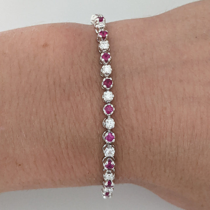 14K .51 CARAT TOTAL WEIGHT DIAMOND ROUND (11) .62 CARAT TOTAL WEIGHT RUBY ROUND (10) FLEXABLE ESTATE BRACELET 9.4 GRAMS