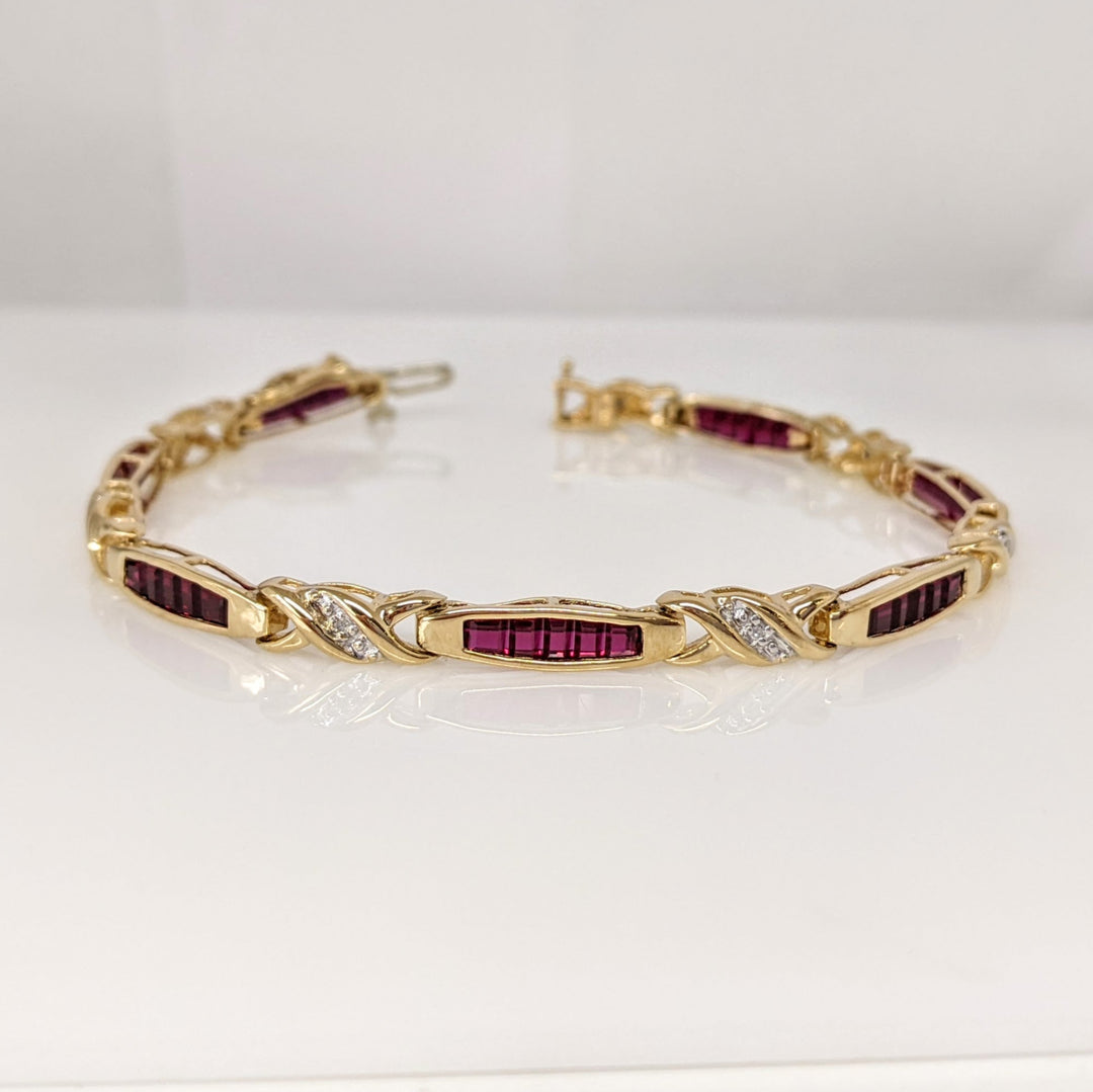 10K LAB-CREATED RUBY BAGUETTE (35) WITH (7) MELEE ESTATE BRACELET 9.1 GRAMS