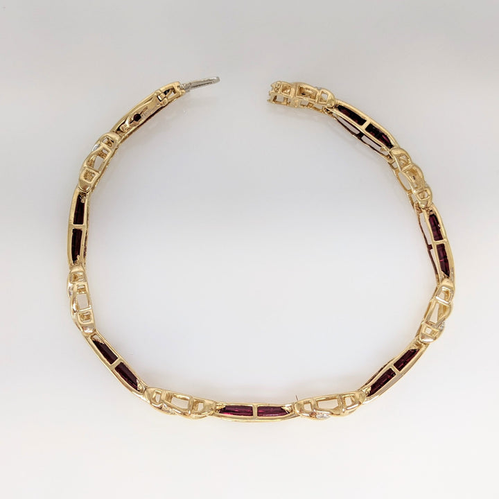 10K LAB-CREATED RUBY BAGUETTE (35) WITH (7) MELEE ESTATE BRACELET 9.1 GRAMS