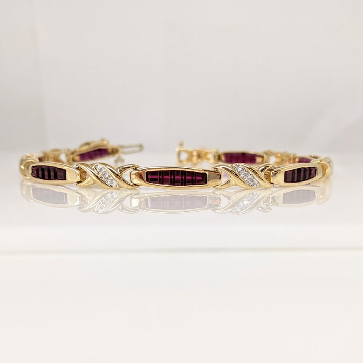 10K LAB-CREATED RUBY BAGUETTE (35) WITH (7) MELEE ESTATE BRACELET 9.1 GRAMS