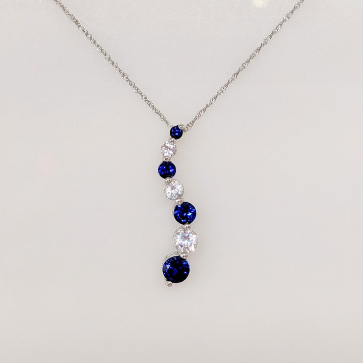 10K WHITE SYNTHETIC BLUE/ WHITE SAPPHIRE JOURNEY ESTATE PENDANT & CHAIN 1.8 GRAMS