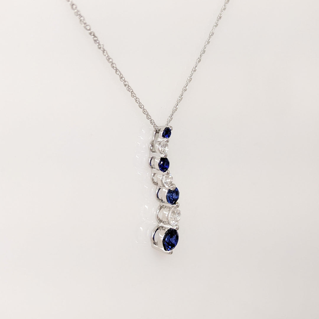 10K WHITE SYNTHETIC BLUE/ WHITE SAPPHIRE JOURNEY ESTATE PENDANT & CHAIN 1.8 GRAMS