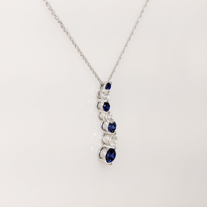 10K WHITE SYNTHETIC BLUE/ WHITE SAPPHIRE JOURNEY ESTATE PENDANT & CHAIN 1.8 GRAMS