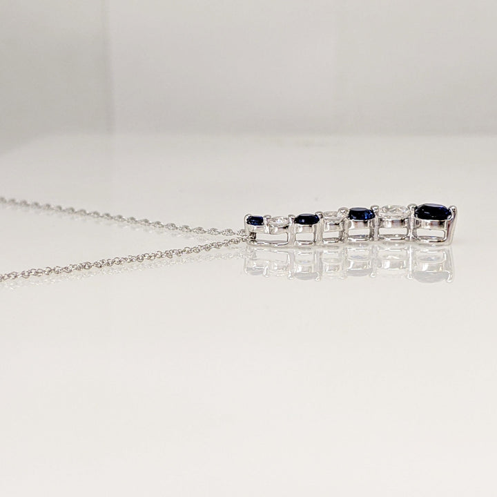 10K WHITE SYNTHETIC BLUE/ WHITE SAPPHIRE JOURNEY ESTATE PENDANT & CHAIN 1.8 GRAMS