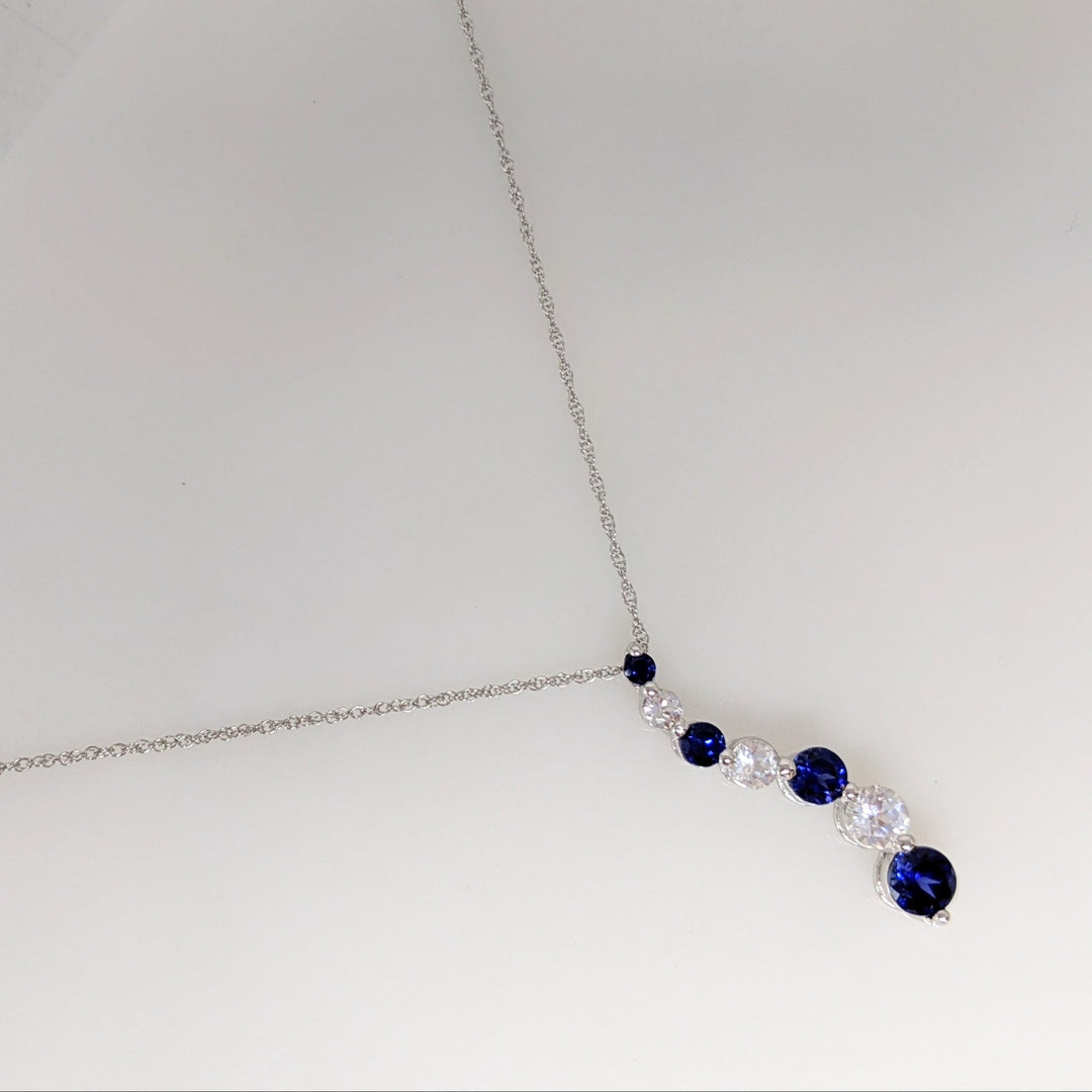10K WHITE SYNTHETIC BLUE/ WHITE SAPPHIRE JOURNEY ESTATE PENDANT & CHAIN 1.8 GRAMS