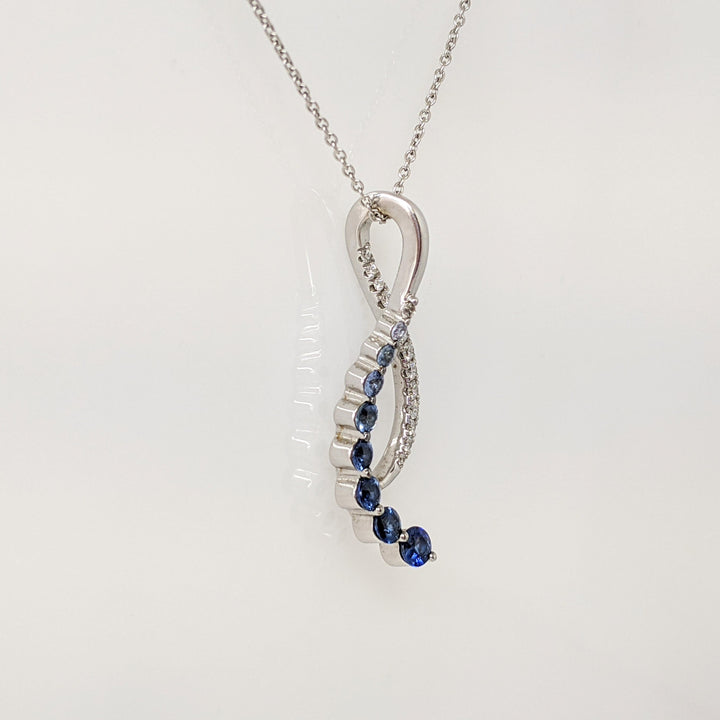 14K WHITE SAPPHIRE ROUND (9) WITH .25 DIAMOND TOTAL WEIGHT ESTATE JOURNEY PENDANT & CHAIN 3.7 GRAMS