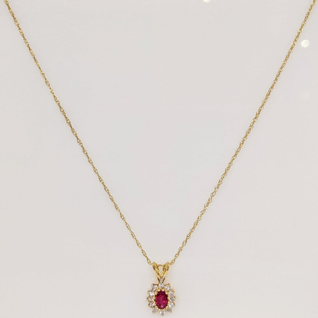 14K RUBY OVAL 4X6 WITH .25 DIAMOND TOTAL WEIGHT (12) ESTATE PENDANT & CHAIN 1.8 GRAMS