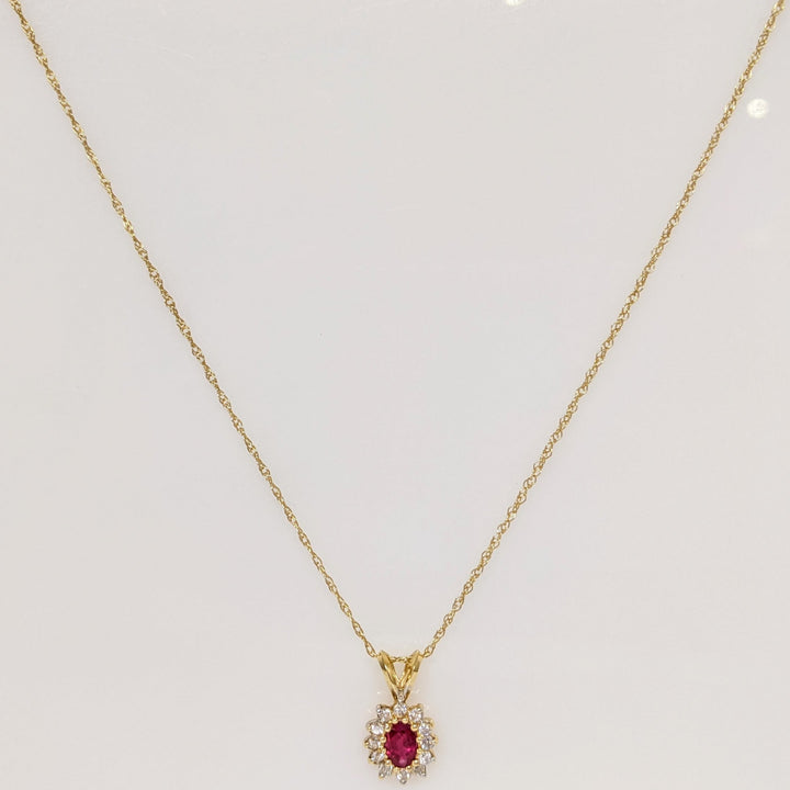 14K RUBY OVAL 4X6 WITH .25 DIAMOND TOTAL WEIGHT (12) ESTATE PENDANT & CHAIN 1.8 GRAMS