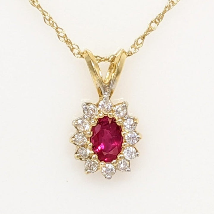 14K RUBY OVAL 4X6 WITH .25 DIAMOND TOTAL WEIGHT (12) ESTATE PENDANT & CHAIN 1.8 GRAMS
