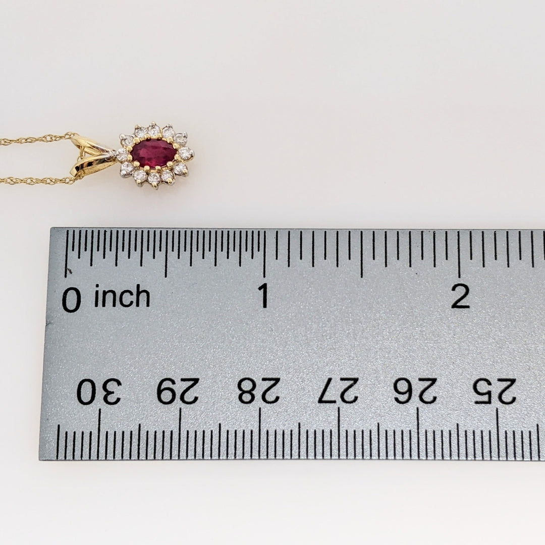 14K RUBY OVAL 4X6 WITH .25 DIAMOND TOTAL WEIGHT (12) ESTATE PENDANT & CHAIN 1.8 GRAMS