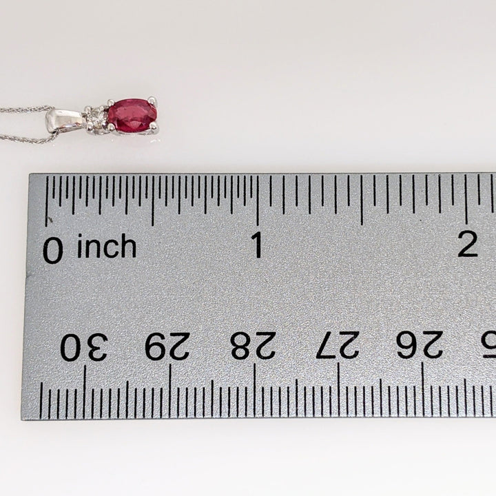 14K WHITE RUBY "AA" OVAL 4X6 WITH .07 CARAT TOTAL DIAMOND ROUND ESTATE PENDANT & CHAIN 2.3 GRAMS