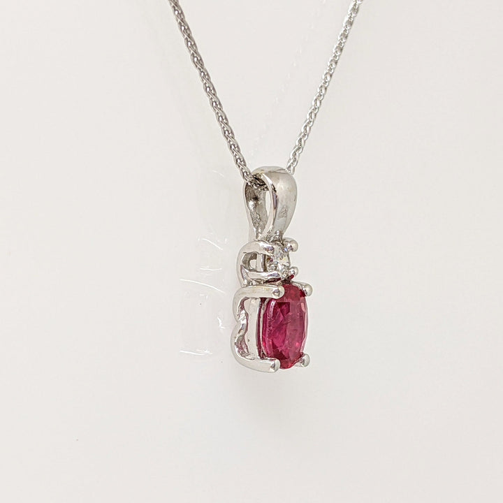 14K WHITE RUBY "AA" OVAL 4X6 WITH .07 CARAT TOTAL DIAMOND ROUND ESTATE PENDANT & CHAIN 2.3 GRAMS
