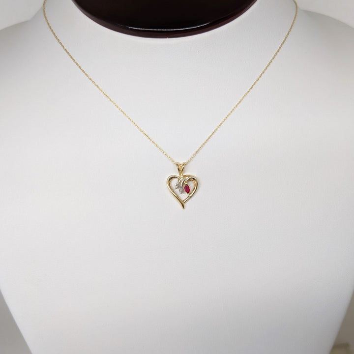 14K RUBY MARQUISE 2X4 WITH (2) MELEE ESTATE PENDANT & CHAIN  1.8 GRAMS
