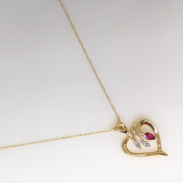 14K RUBY MARQUISE 2X4 WITH (2) MELEE ESTATE PENDANT & CHAIN  1.8 GRAMS