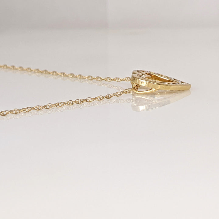 14K .40 CARAT TOTAL WEIGHT I1 I-J DIAMOND ROUND (16) CHANNEL SET ESTATE HEART PENDANT & CHAIN 2.7 GRAMS
