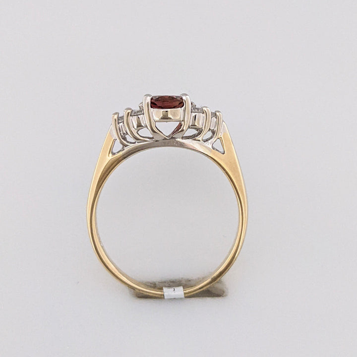 14K TOURMALINE OVAL 5X7 WITH (6) MELEE ESTATE RING 3.4 GRAMS