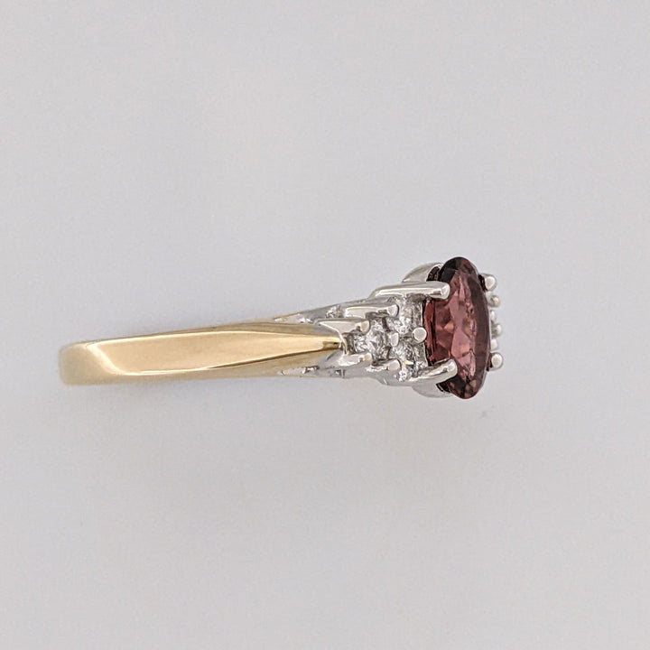 14K TOURMALINE OVAL 5X7 WITH (6) MELEE ESTATE RING 3.4 GRAMS