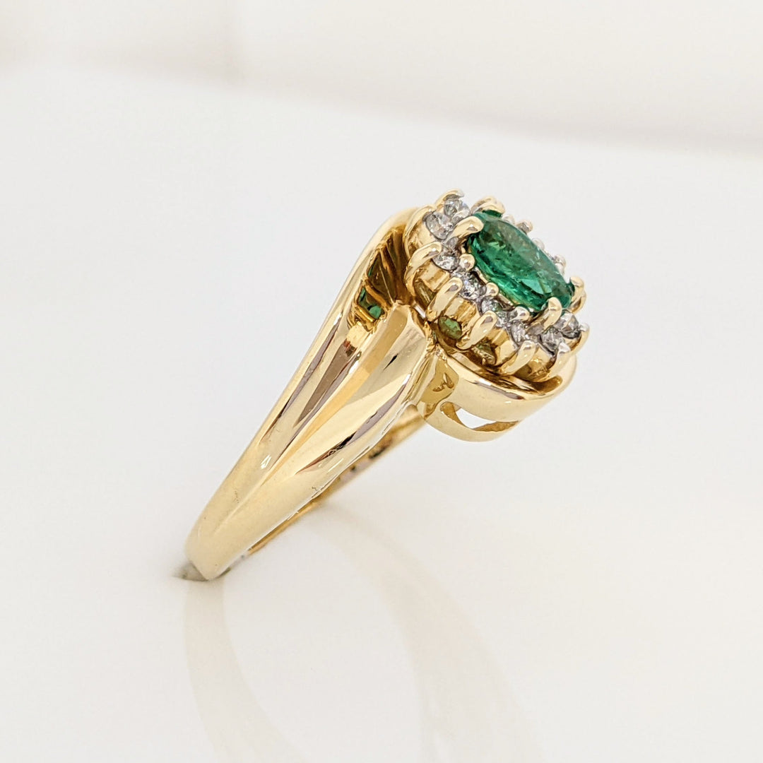 14K EMERALD OVAL  4X6 WITH .12 DIAMOND TOTAL WEIGHT (12) ROUND ESTATE RING 4.7 GRAMS