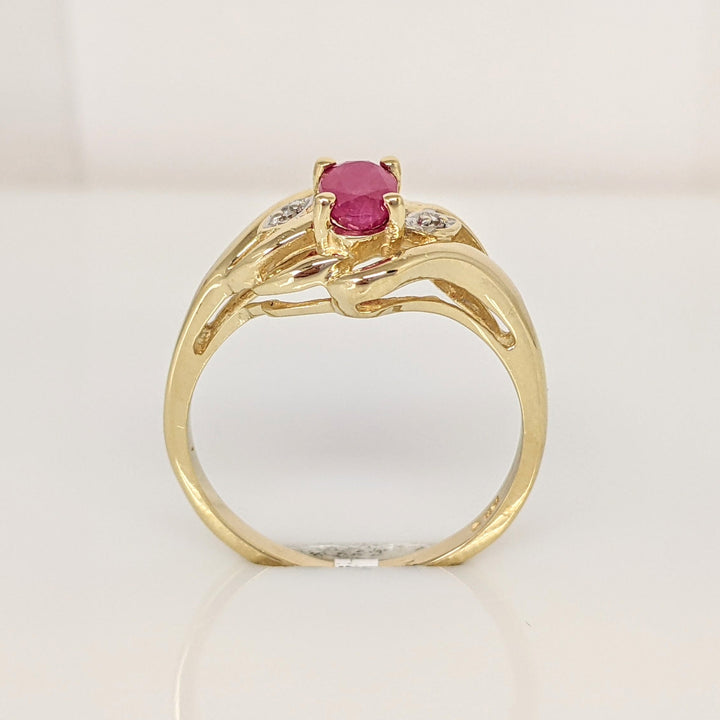 10K RUBY OVAL 4X6 WITH MELEE ESTATE RING 2.6 GRAMS