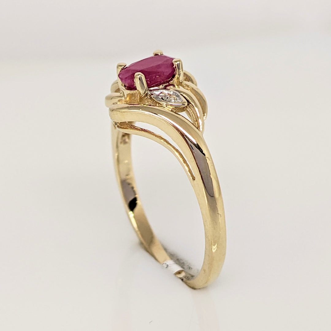 10K RUBY OVAL 4X6 WITH MELEE ESTATE RING 2.6 GRAMS