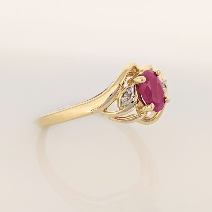 10K RUBY OVAL 4X6 WITH MELEE ESTATE RING 2.6 GRAMS