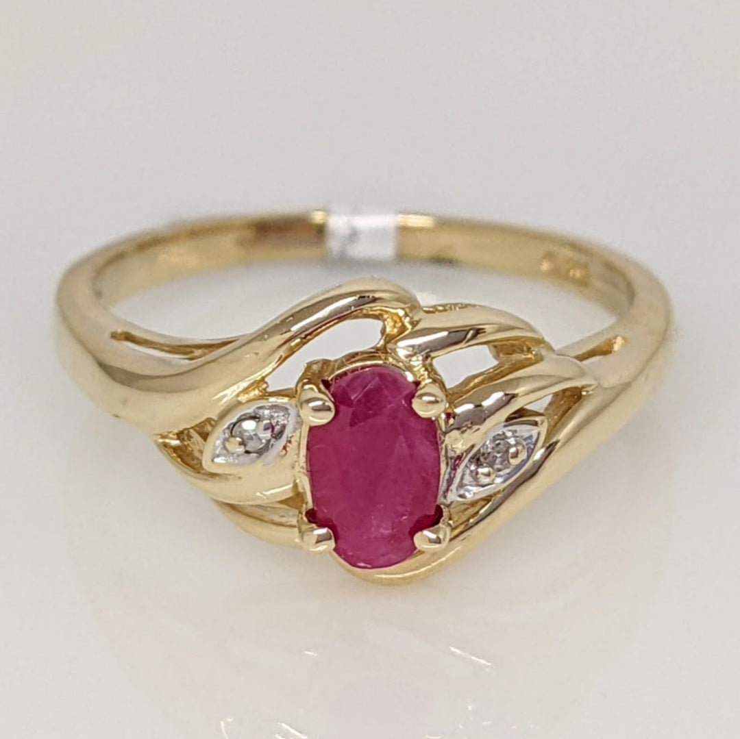 10K RUBY OVAL 4X6 WITH MELEE ESTATE RING 2.6 GRAMS