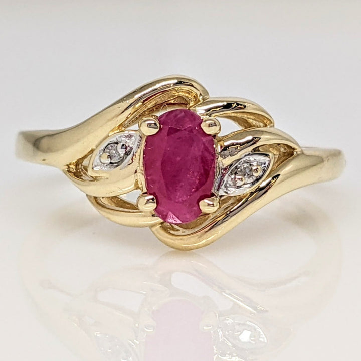 10K RUBY OVAL 4X6 WITH MELEE ESTATE RING 2.6 GRAMS
