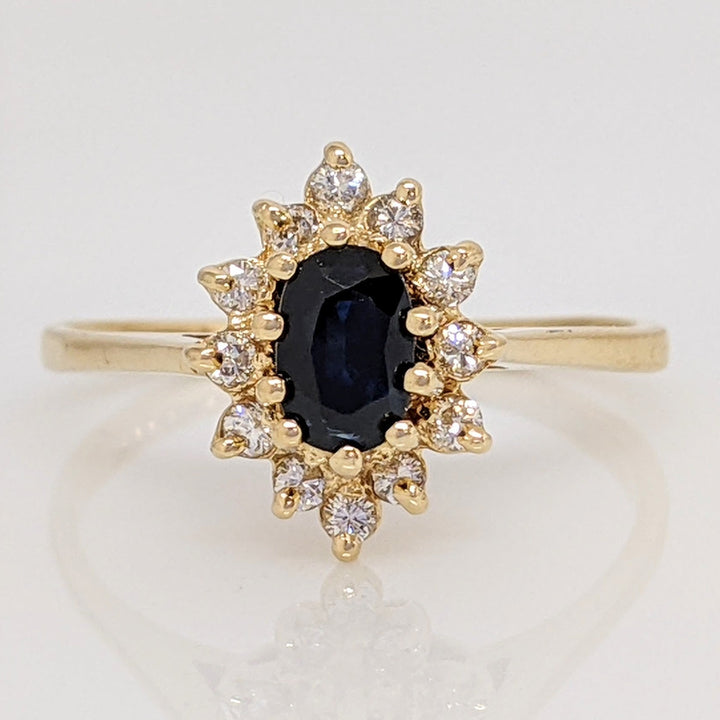 14K SAPPHIRE OVAL 5X7 WITH .36 DIAMOND TOTAL WEIGHT (12) ROUND ESTATE RING 3.1 GRAMS