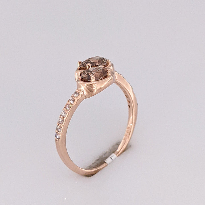 14K ROSE .69 CARAT TOTAL WEIGHT SI2 CHAMPAGNE PEAR (2) ROUND (14) ESTATE BYPASS RING 2.1 GRAMS
