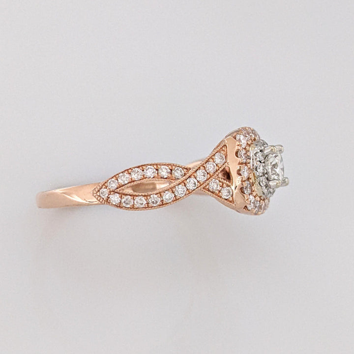 14K ROSE .66 CARAT TOTAL WEIGHT SI-I1 H-I DIAMOND ROUND (55) NEIL LANE TWIST HALO ESTATE RING 4.3 GRAMS