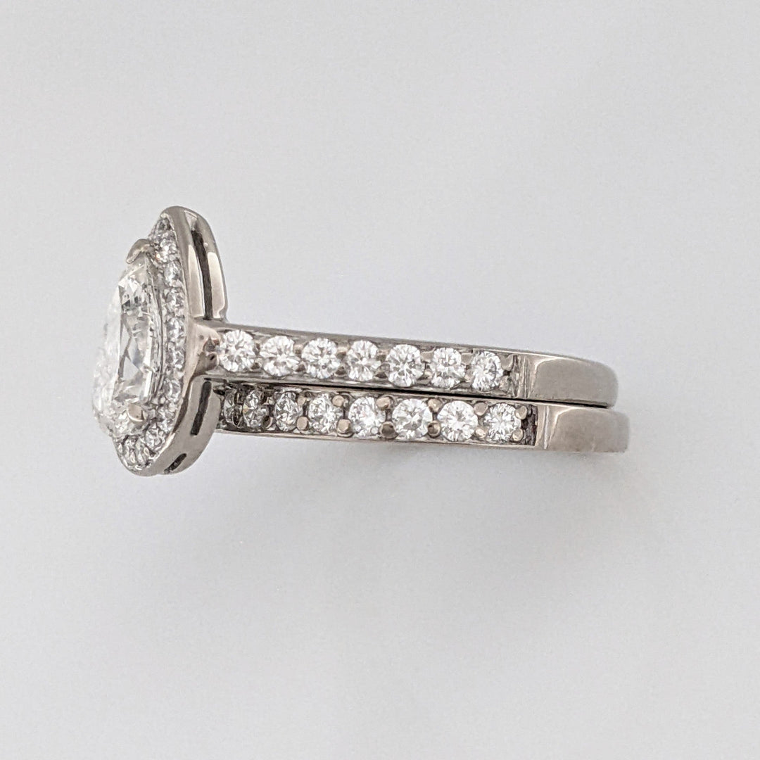18K WHITE .83 CARAT TOTAL SI2 F DIAMOND PEAR WITH ROUNDS ESTATE RING/ BAND SET